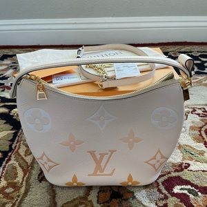 Louis Vuitton Empreinte Monogram Giant Marshmallow Hobo Cream Saffron